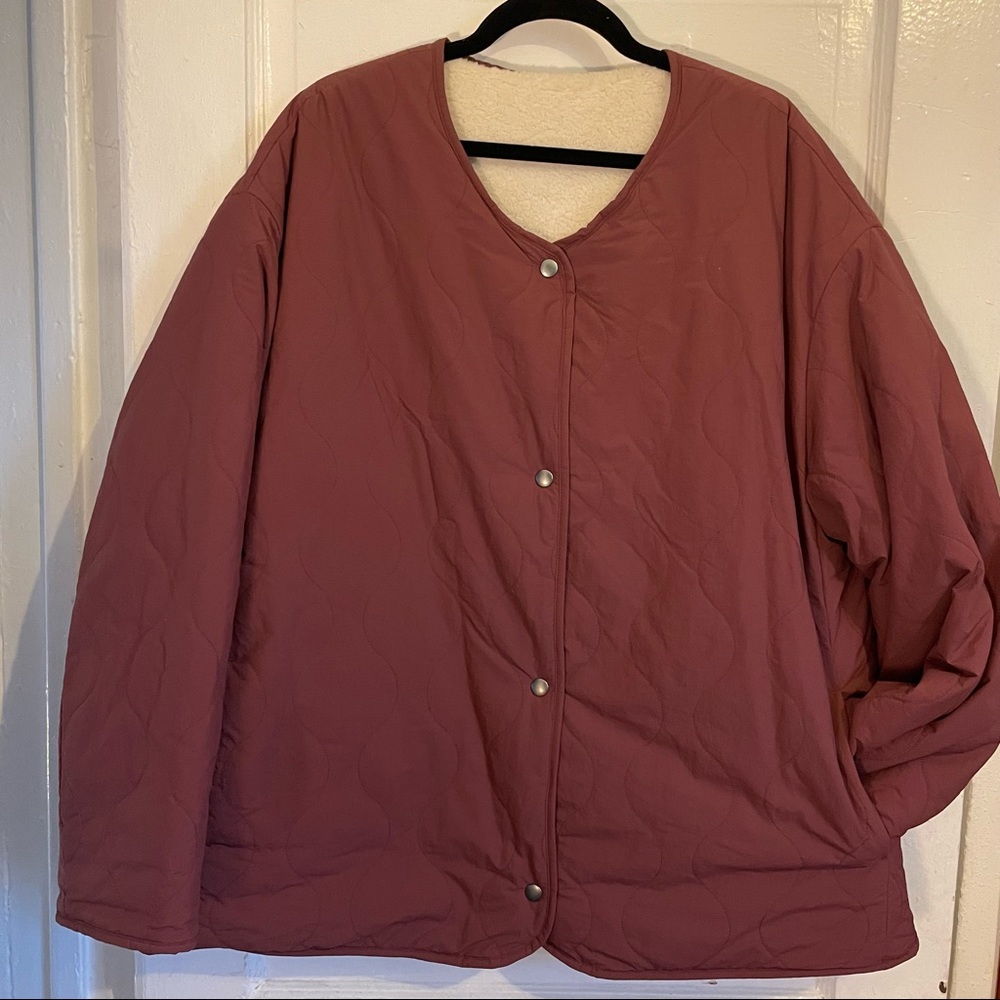 Uniqlo reversible Quilted jacket with faux fur lining..